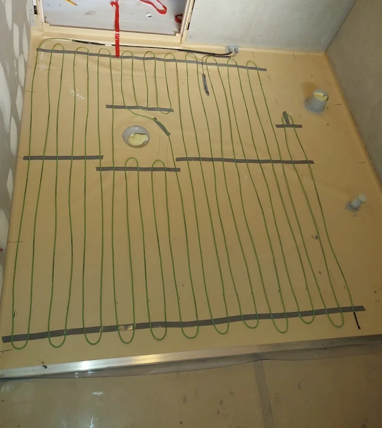 Underfloor heating cable layout during the Avoca Beach bathroom renovation