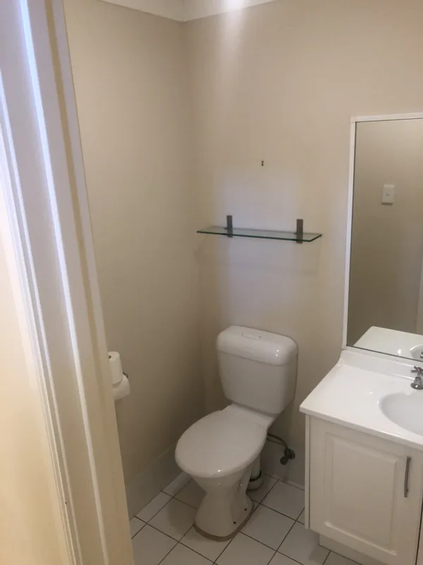 Downstairs powder room before renovation in Bateau Bay