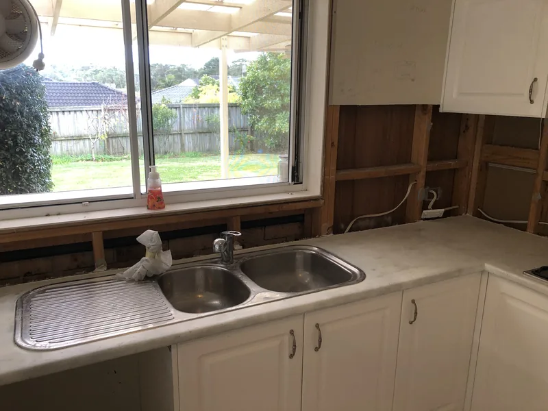Kitchen during initial strip-out before renovation in Bateau Bay