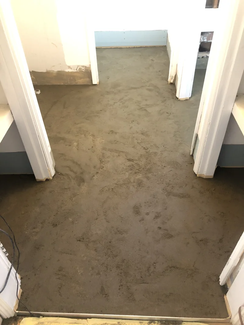 Concrete floor prepared for new flooring during the Erina renovation