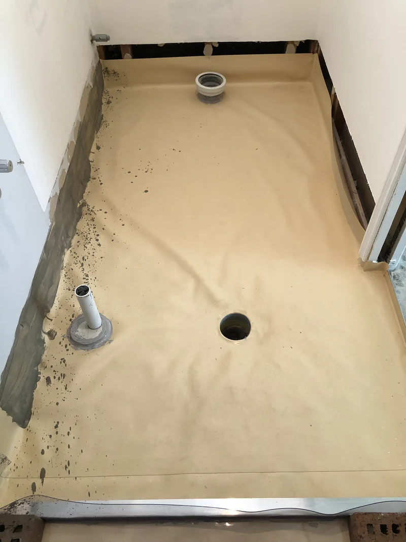 Ensuite shower base before waterproofing during the Erina renovation