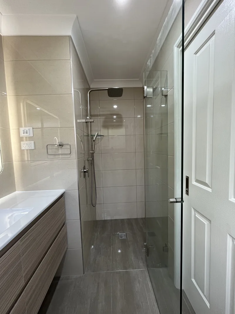 Frameless shower and cavity sliding door after the Mardi ensuite renovation