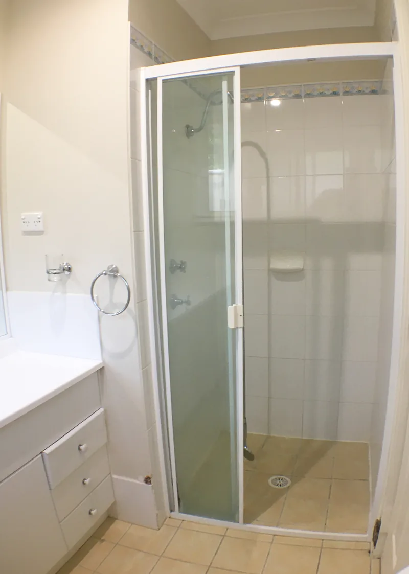 Framed shower enclosure before the Mardi ensuite renovation