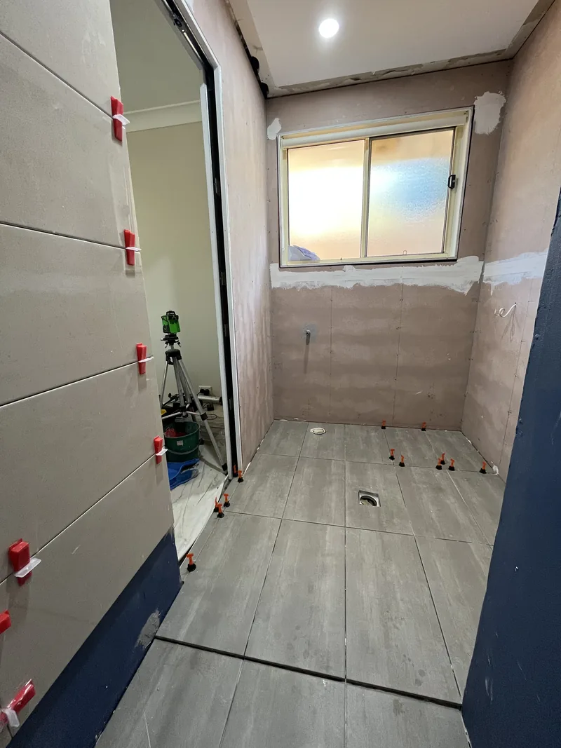 Floor tile set-out around the wastes during the Mardi ensuite renovation