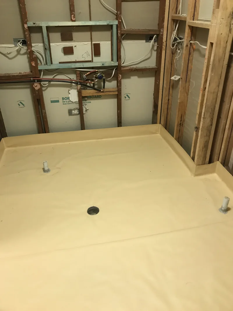 Main bathroom floor and plumbing penetrations during the Terrigal renovation