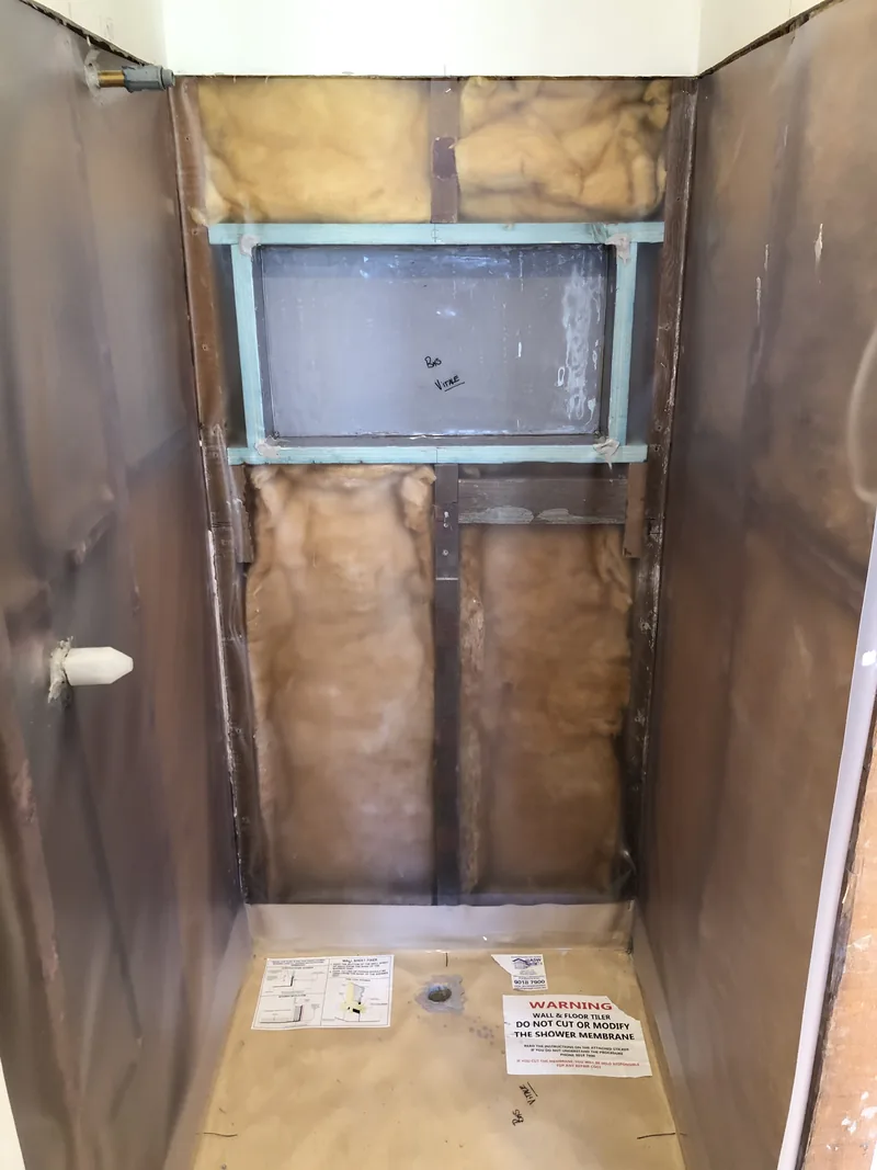 Shower wall framing and insulation during the Umina renovation