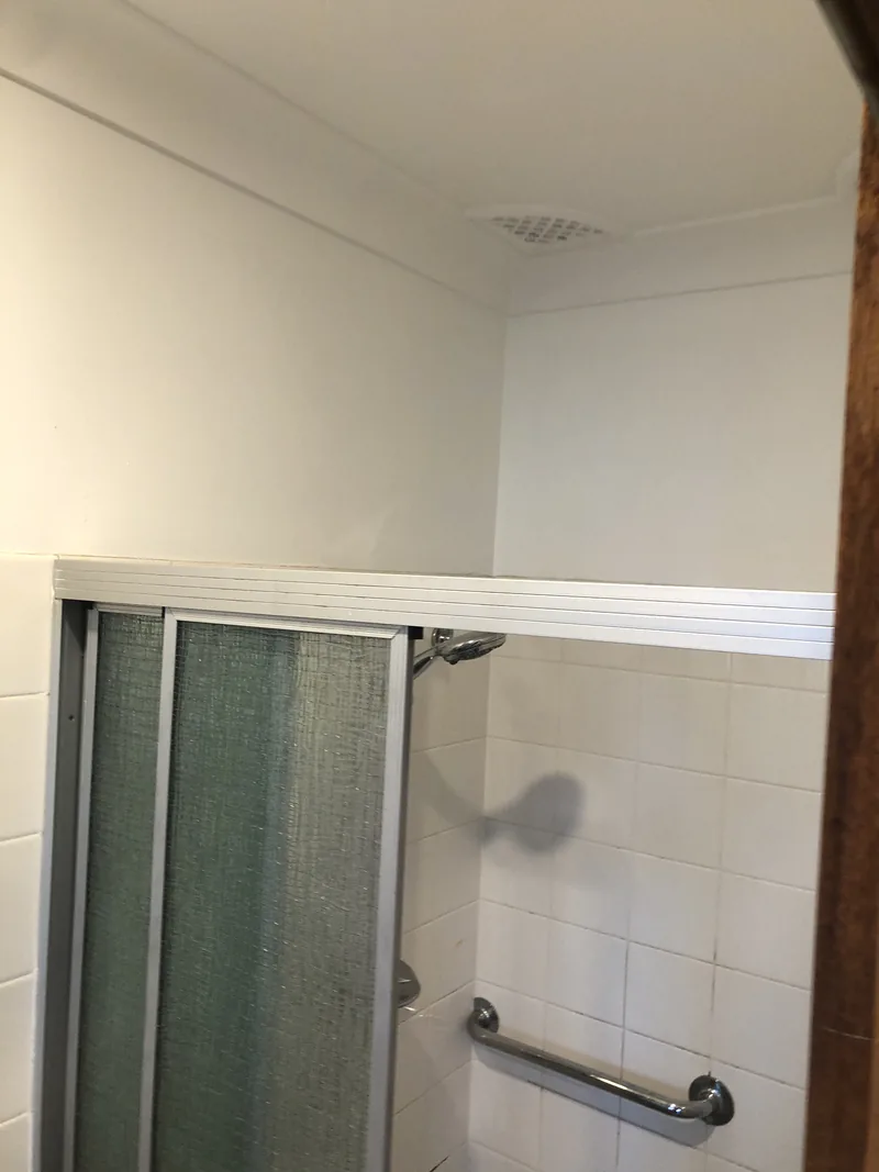 Enclosed shower before renovation in Umina