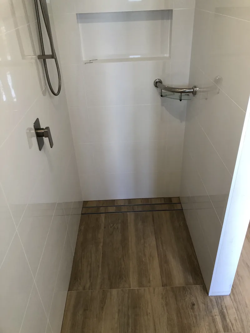 Shower niche and fittings after renovation in Umina