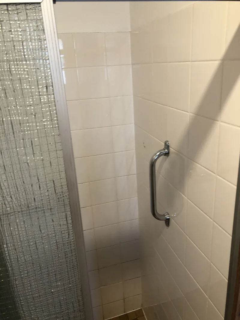 Shower interior before renovation in Umina